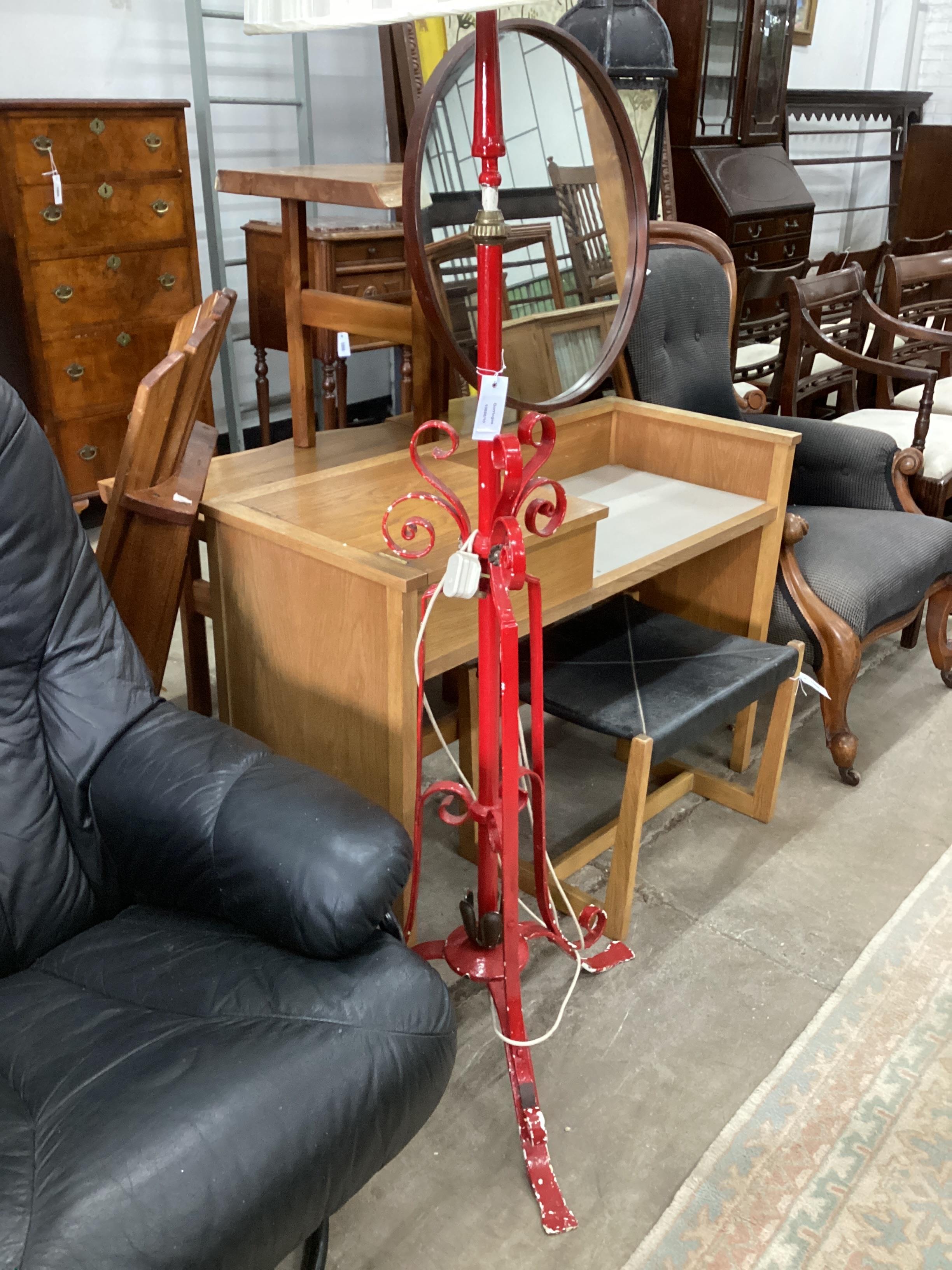 An Edwardian brass mounted wrought iron telescopic standard lamp, converted and later painted.